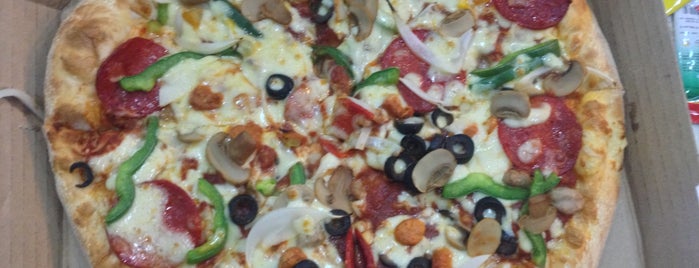Domino's Pizza is one of Eating out in Saigon.