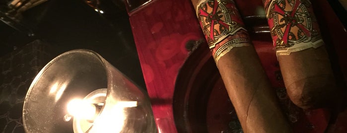 Merchants Cigar Bar is one of Random NY places to try.