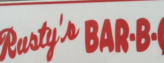 Rusty's Bar-B-Q is one of สถานที่ที่บันทึกไว้ของ Christopher.