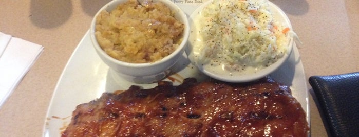 Smokehouse Grill and Buffet is one of Locais curtidos por John.