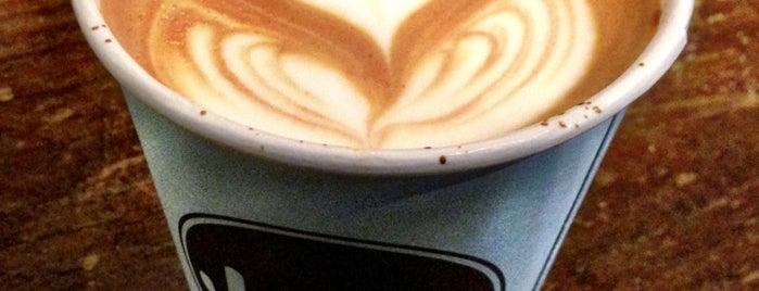 Joe Coffee Company is one of • a coffee & a laptop.