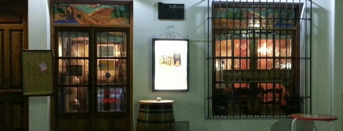 Restaurante-Asador La Muralla is one of Locais salvos de Jim.