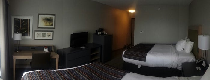 Country Inn & Suites By Radisson, Springfield, IL is one of สถานที่ที่ Curtis ถูกใจ.