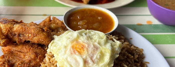 The Warung (Nasi Kuning/Nasi Lalap) is one of Tempat makan.