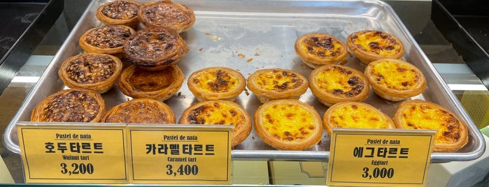 Pastel de nata is one of here and there.