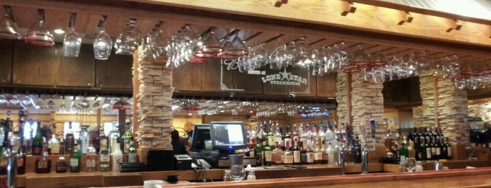 Lone Star Steakhouse & Saloon is one of My wine's spots.