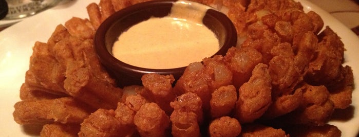 Outback Steakhouse is one of Must-go Places.