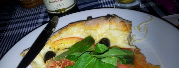 Pizzaria Toscanella is one of Locais curtidos por Cris.
