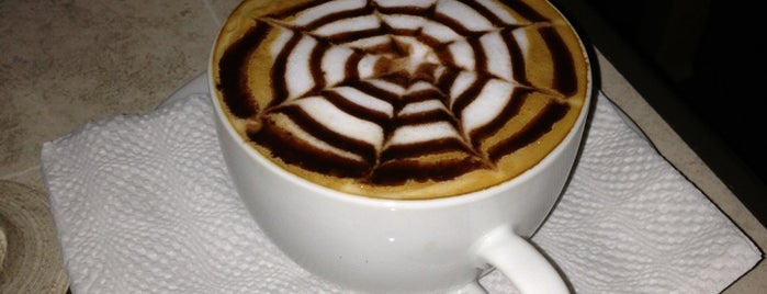 CoffeeHolics Espresso Bar is one of Cafés con baristas y pura calidad HON.