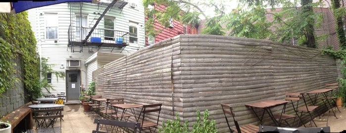 Champion Coffee is one of NYC: Best Coffee Shop Gardens.