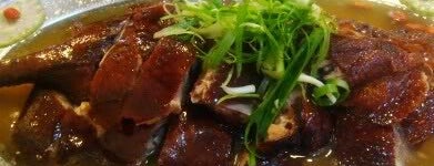 Brother Kuan Roasted Duck 坤哥车仔饭店 is one of food.