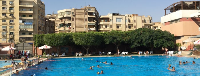 Heliopolis Sporting Club is one of Places.