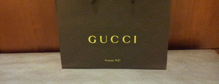 Gucci is one of Lieux qui ont plu à Christopher.