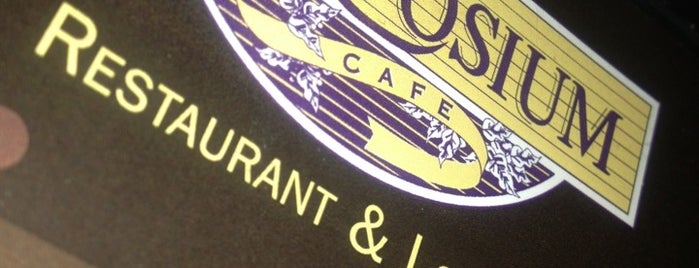 Symposium Café Restaurant & Lounge is one of Posti che sono piaciuti a Kip.