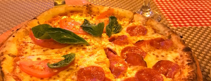 La bella italia is one of The 15 Best Places for Pizza in Playa Del Carmen.