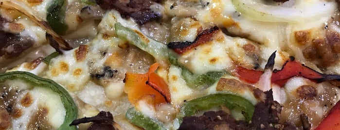 Domino's Pizza is one of Lieux qui ont plu à Jan.