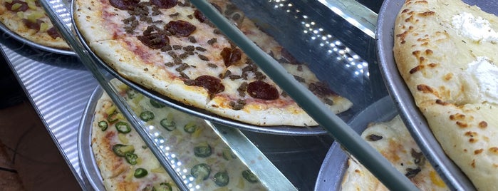 99¢ Pizza is one of Karen : понравившиеся места.