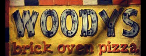 Woody's Brick Oven Pizza is one of Tempat yang Disukai eva.