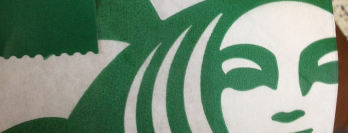 Starbucks is one of Locais salvos de Sean.