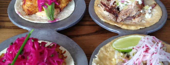 Distrito by Iron Chef Jose Garces is one of Places to try.