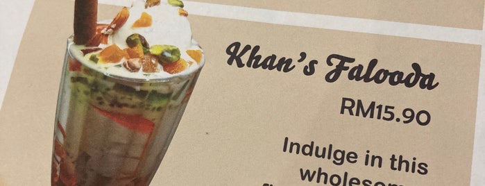 Khan’s Restaurant & Cafe is one of Lugares favoritos de William.
