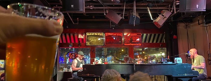 Mojo's Dueling Piano Bar is one of bars :).