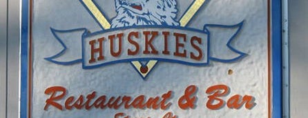 Huskies Restaurant & Bar is one of bars.