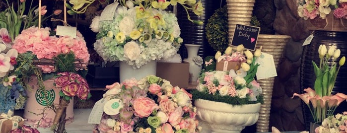 Four Seasons Arrangement Flower Boutique is one of Rawan’s Liked Places.