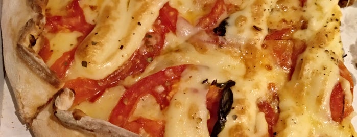 The Petít Pizza na Pedra is one of Favorites.