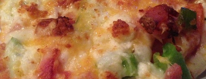 Mo's Pizza is one of Locais curtidos por Kate.