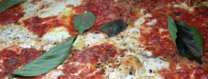 Rocco's Pizza Joint is one of สถานที่ที่บันทึกไว้ของ Christina.