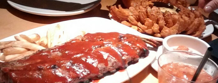 Outback Steakhouse is one of Comes & Bebes.