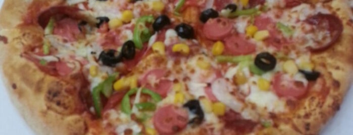 Domino's Pizza is one of Tempat yang Disimpan Rıdvan.