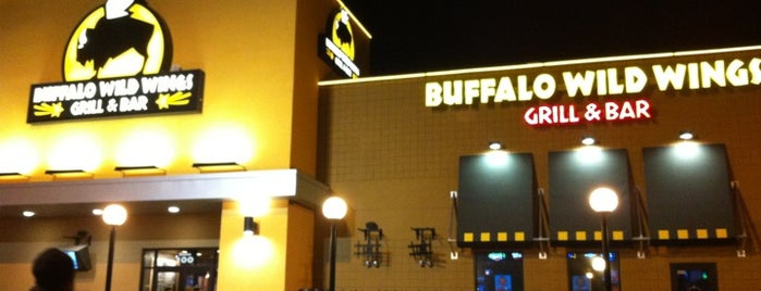 Buffalo Wild Wings is one of สถานที่ที่ Eric ถูกใจ.