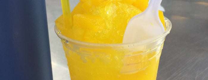 Juice N Fruit Raspados is one of best places.