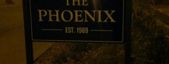 The Phoenix Bar & Grill is one of สถานที่ที่ Severine ถูกใจ.