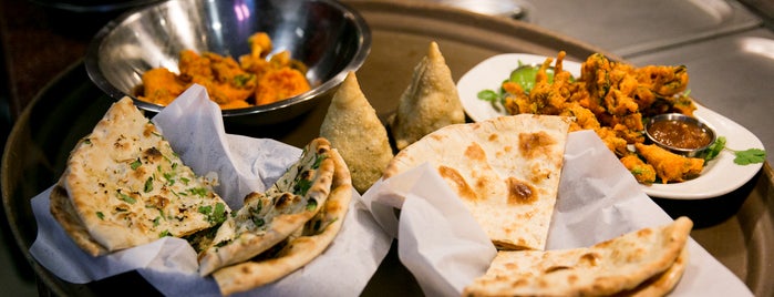 Gandhi Indian Restaurant is one of Tempat yang Disukai Matt.