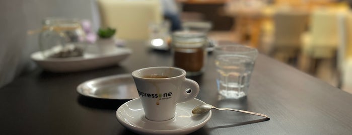 Espressone Office Café is one of Holesky.