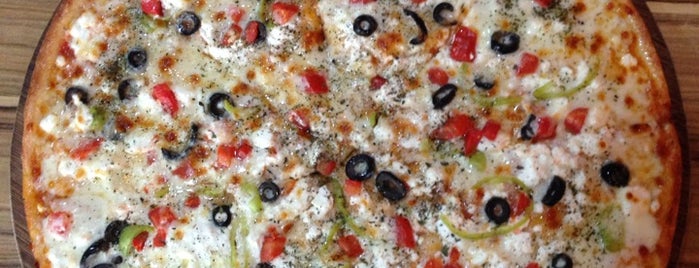 Quick Pizza is one of Locais curtidos por Brkgny.