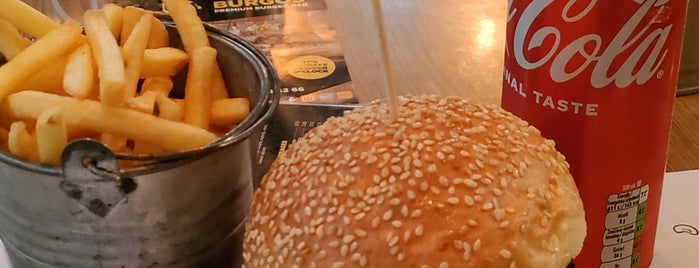 Burgos Premium Burger Bar is one of Gidilecekler.