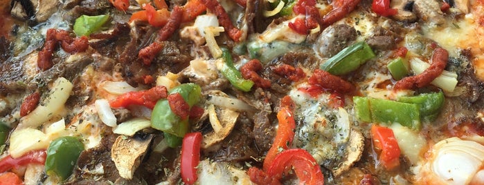 Italiensk Gastronomi Leo's Pizza is one of Lugares favoritos de Mirza.