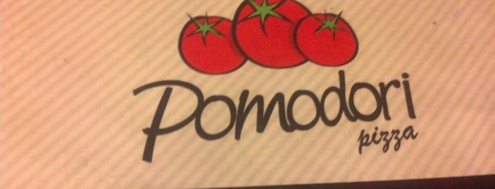 Pomodori Pizza is one of สถานที่ที่ Paula ถูกใจ.