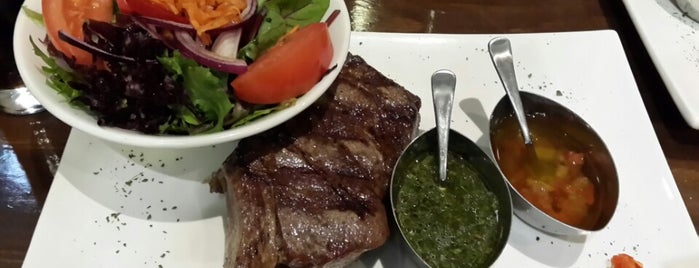 Buenos Aires Steakhouse is one of สถานที่ที่บันทึกไว้ของ Mariella.
