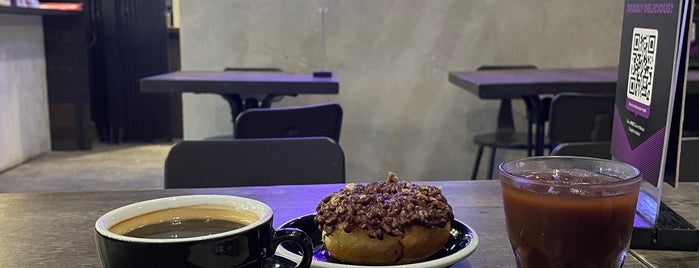 Poison Coffee & Doughnuts is one of Manila.
