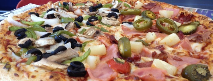Domino's Pizza is one of Locais curtidos por Brenda.