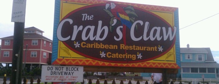 Crab's Claw Oceanfront Caribbean Restaurant is one of Tempat yang Disukai Kami.
