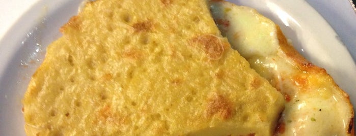 Banchero is one of Pizzerías destacadas.