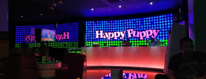 Happy Puppy Karaoke Keluarga is one of สถานที่ที่ Andre ถูกใจ.