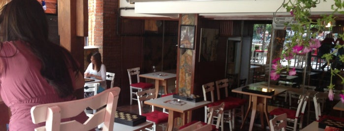 Dante Cafe is one of สถานที่ที่ Murat ถูกใจ.
