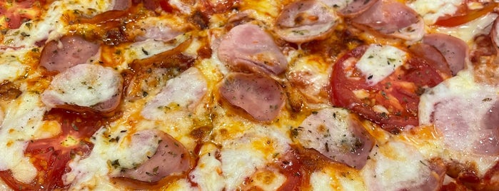 Domino's Pizza is one of Pelo Brasil.